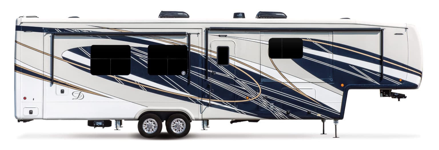 Side view of a large, modern fifth-wheel RV with multiple windows and a colorful, abstract design in blue, gold, and white on its exterior. It has two axles with double wheels and is designed for towing.